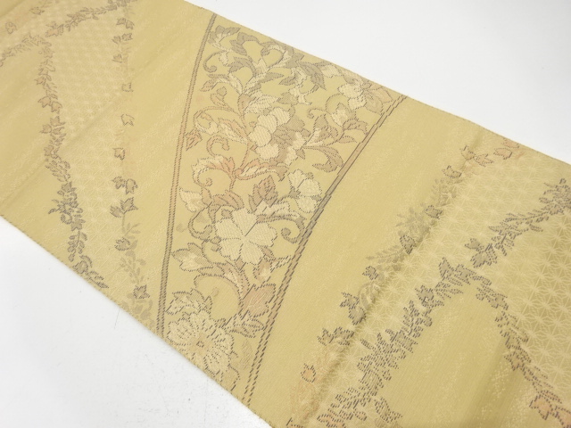 唐花模様織り出し　名古屋帯